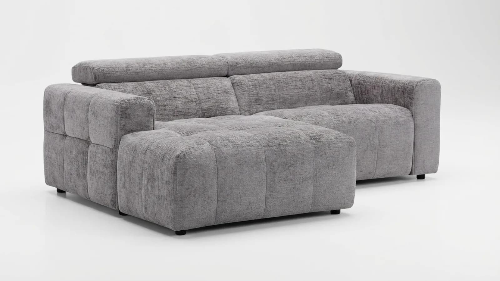 A grey fabric sectional sofa as a plain product photo on a white background